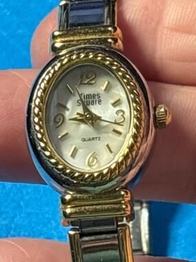 Women's Two-Tone Gold and Silver Oval Quartz Watch